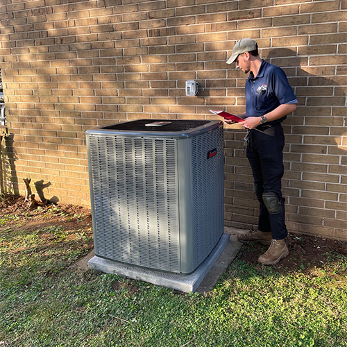 Outdoor unit being cleared for service by one of our techs